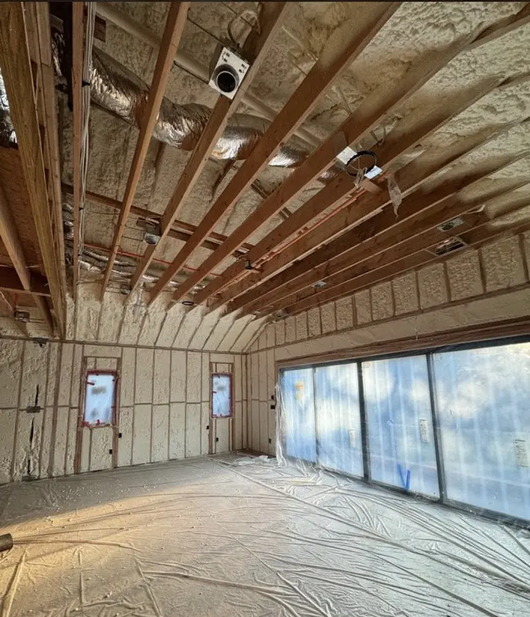 Interior walls and ceiling insulated with spray foam during new construction in Elkhorn